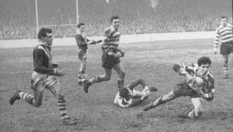 Alan Kellett, watched by John Noon and Alan Davies, in action against Walney Central - Feb 27th 1960.