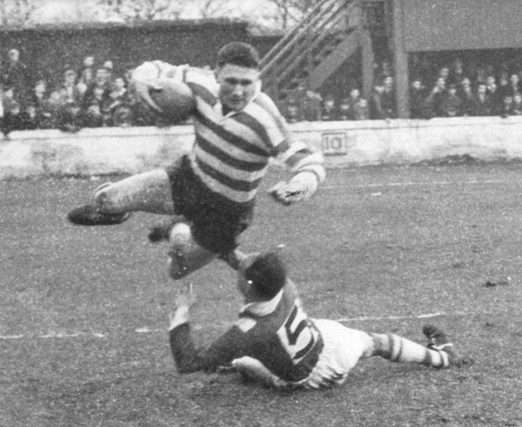 Ike Soutward leaps over a tackle v Walney Central - Feb27th 1960.