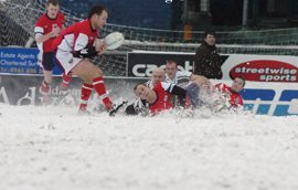 Gareth Barber loses possession on a snow covered Boundary Park against Saddleworth Rangers - March 12th 2006.