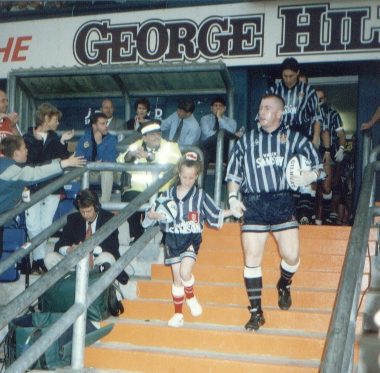 Martin Crompton lead out the Oldham team against Adelaide Rams - July 25th 1997.