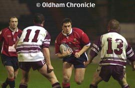 Dave Newton takes on the Manly defence - Nov 19th 2003.