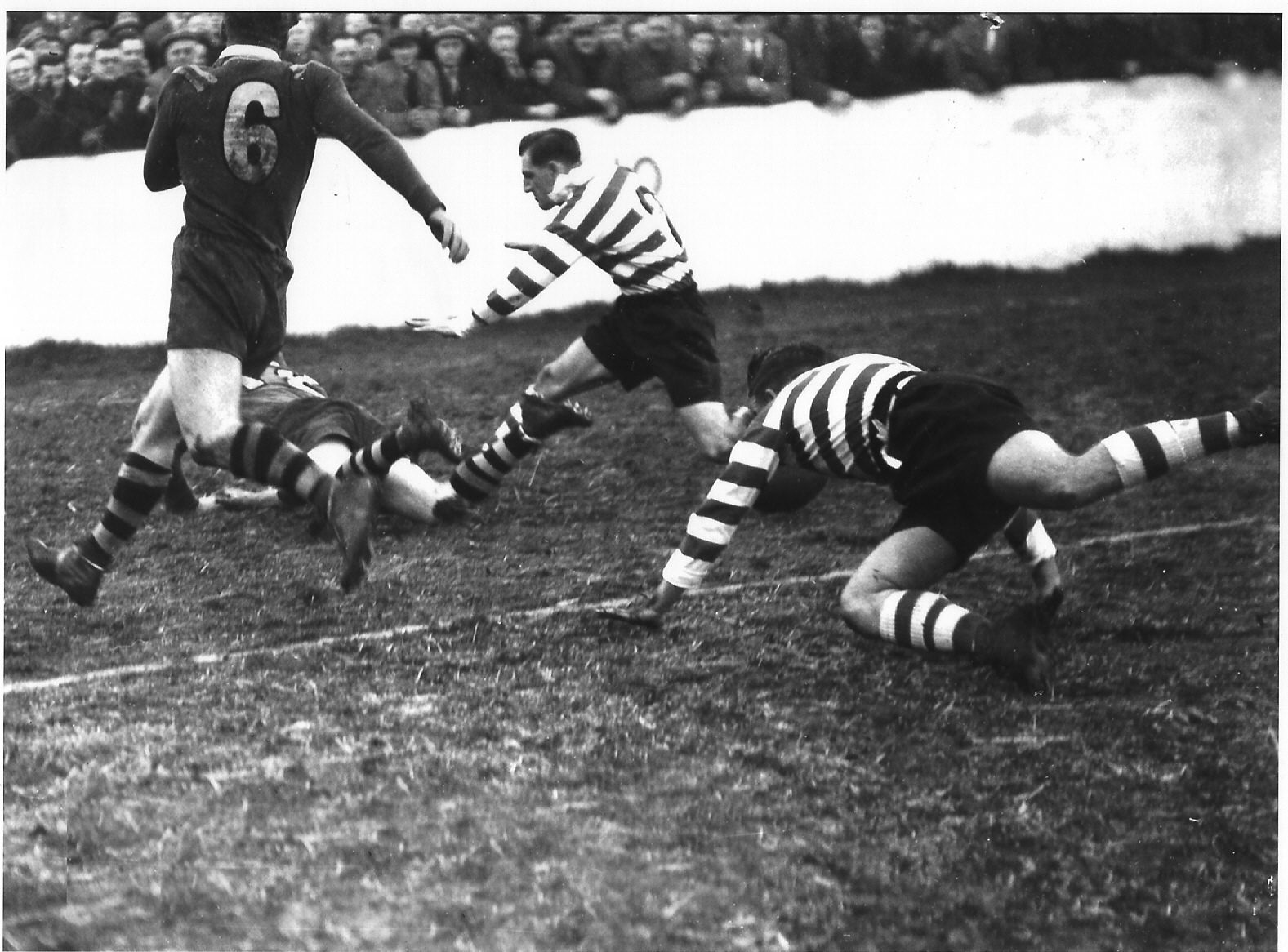 John Hawke evades Bob Batten and Irving Barraclough to score Dec 4th 1948.