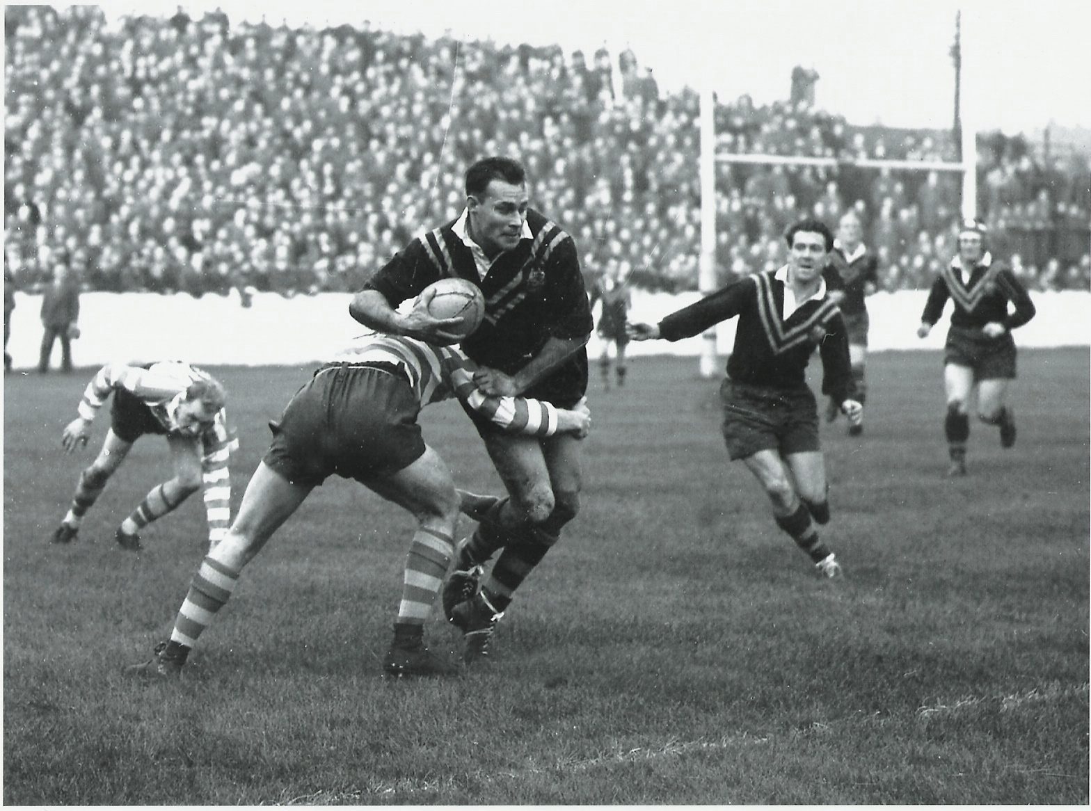 Alex Watson is tackled by John Etty. Nov 7th 1956.