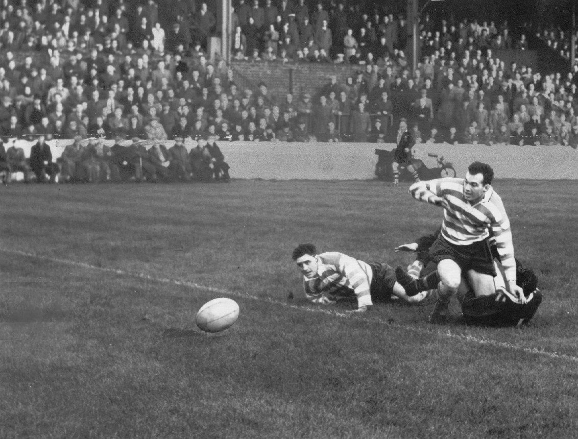 Derek Turner and Alan Davies watch the ball as (out of shot) Frank Pitchford runs in to score. Nov 7th 1956.