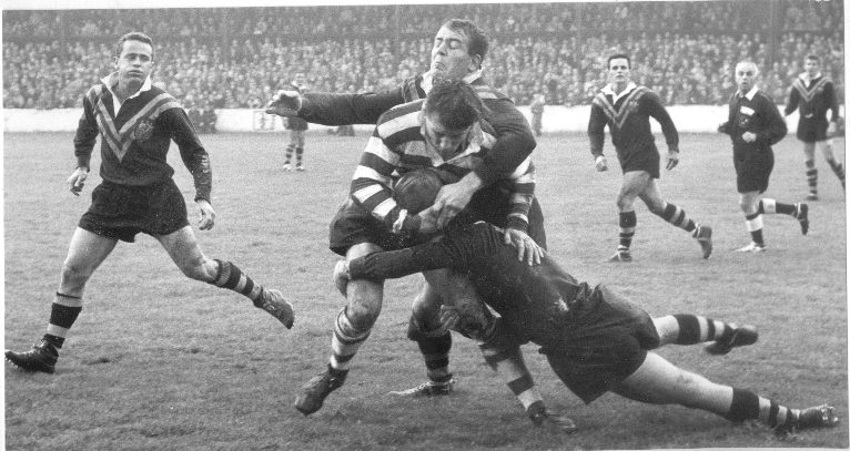 Dick Thornett brings down Dave Parker while Barry Muir looks on. Oct 5th 1963.