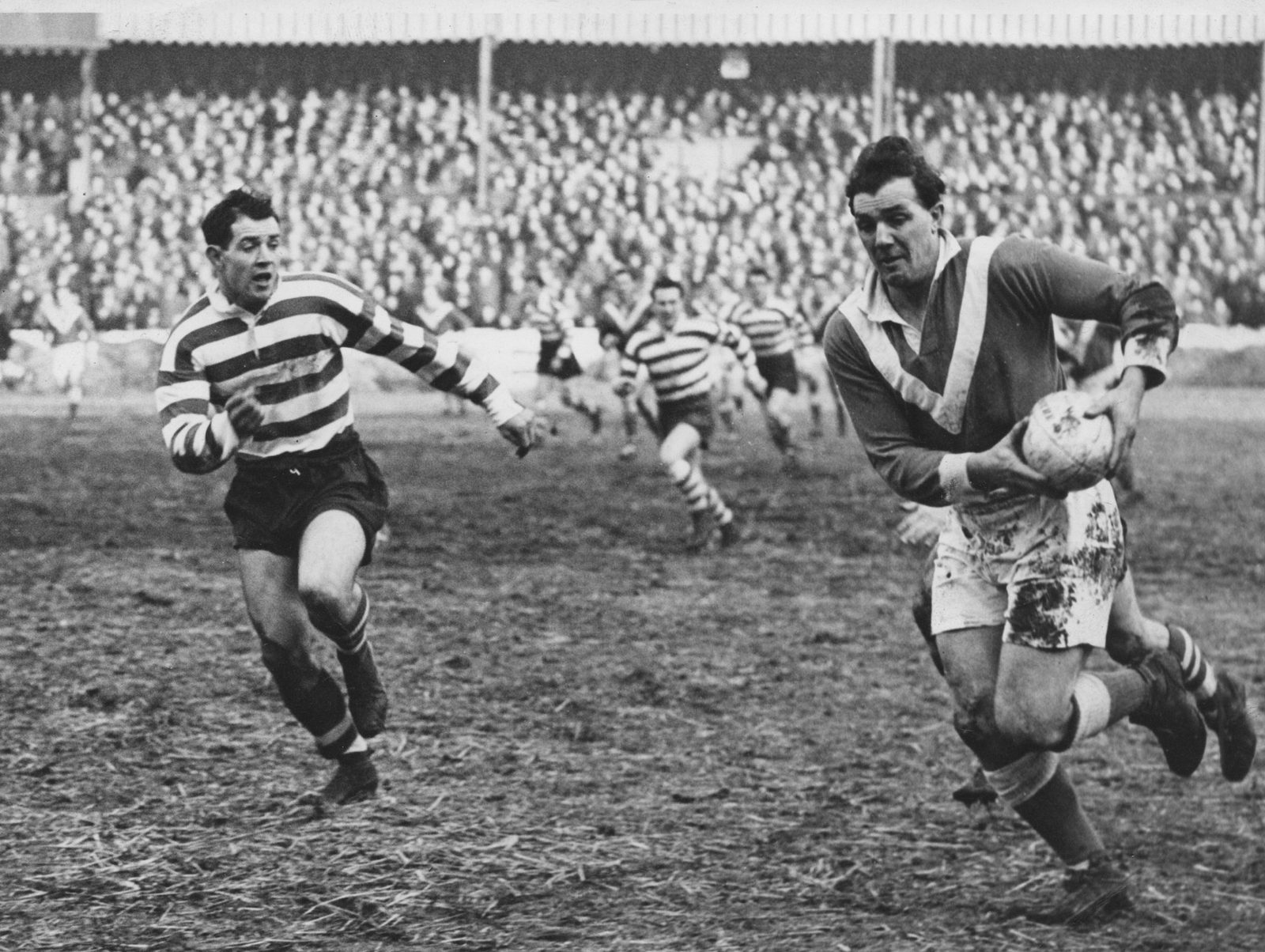 Alan Davies chases Phil Jackson - Jan 11th 1958.