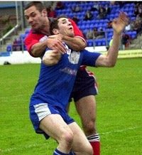 Joe McNicholas tackles Jamie Marshall - June 16th 2002.
