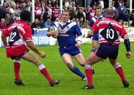 Bryan Henare & Paul Norton prepare to stop Steve Jackson - June 16th 2002.