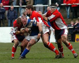 Kirkland, Hodson and Hayes tackle McDermott - April 2nd 2006.