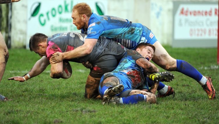 Two Barrow defenders put an end to an Oldham attack - Jan 24th 2016.