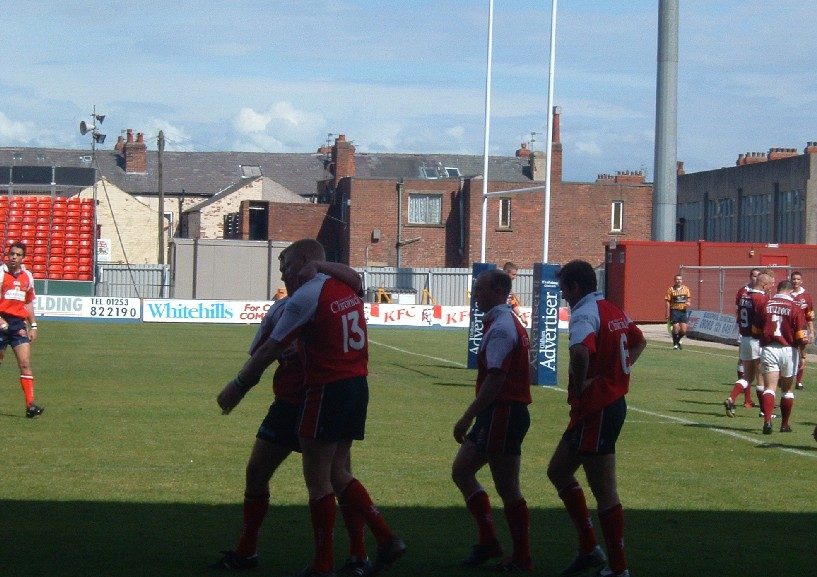 The players congratulate try scorer Lee Marsh - May 30th 2004.