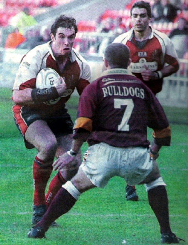 Lee Doran takes on the Batley scrum half with Pat Rich in support - May 30th 2004