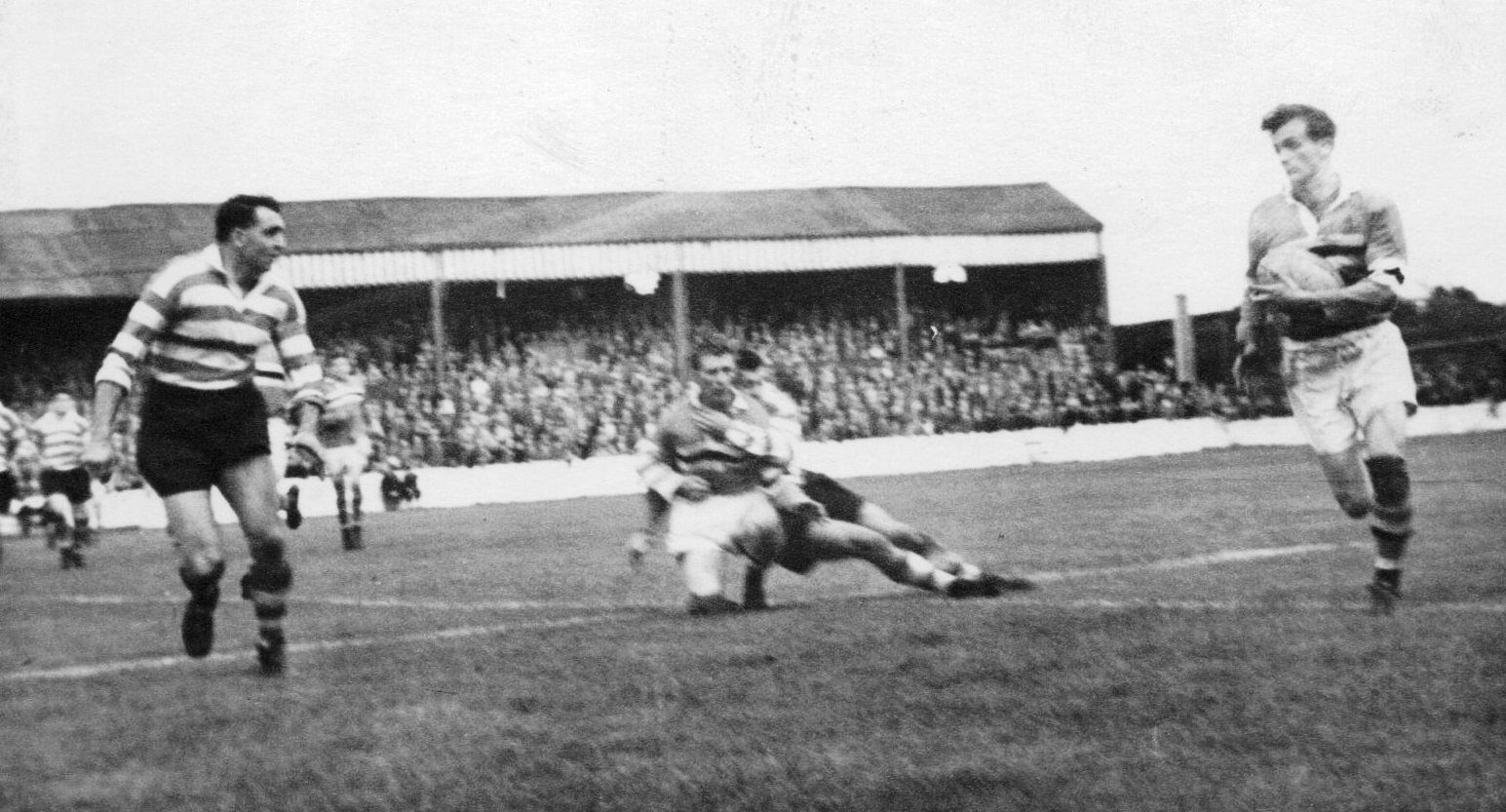 Cracknell moves in to tackle his opposite number against Blackpool - Sep 27th 1958.