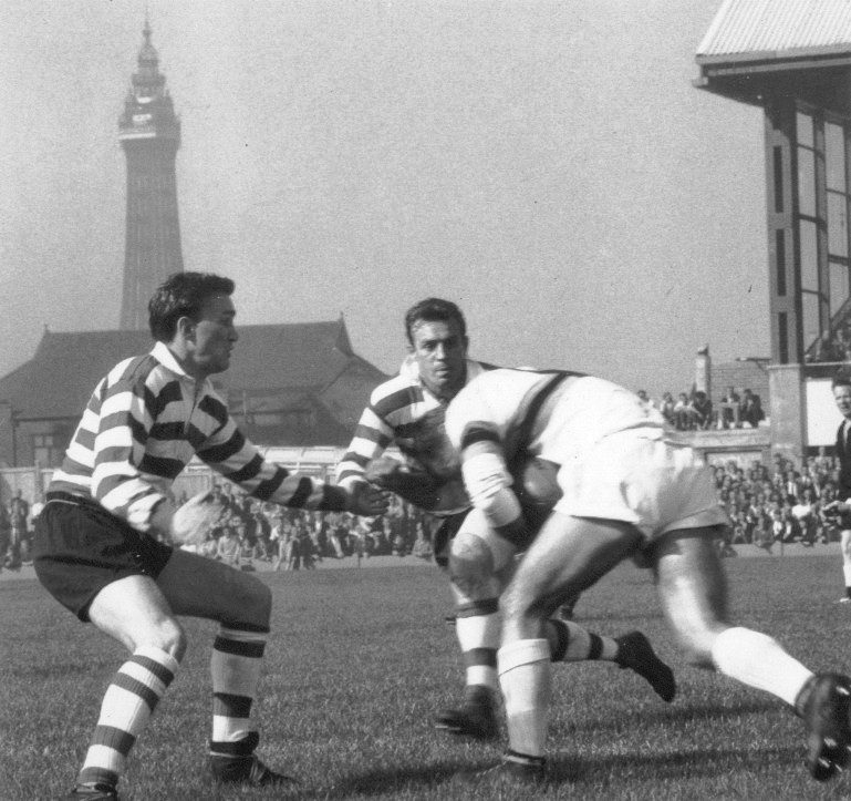 Geoff Sims and Brian Lord move in on a Blackpool opponent - Sep 16th 1963. Blackpool