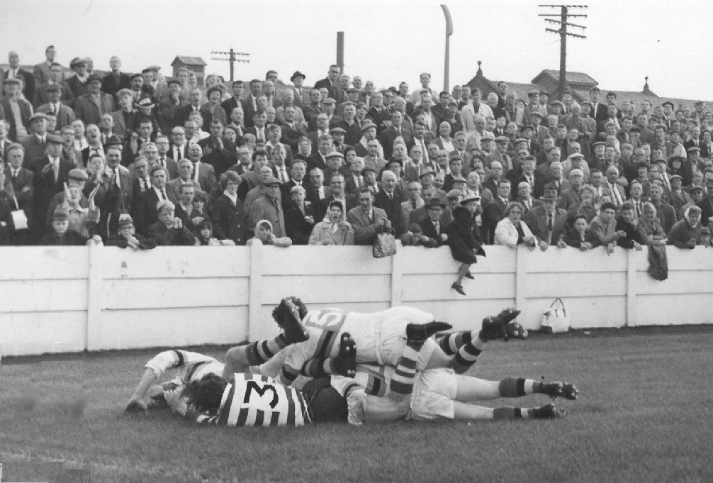 John Donovan is swamped by Blackpool defenders - Sep 13th 1965.