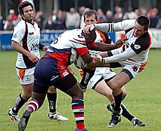 Blackpool's Damien Munroe struggles to halt an Oldham attack - June 22nd 2008