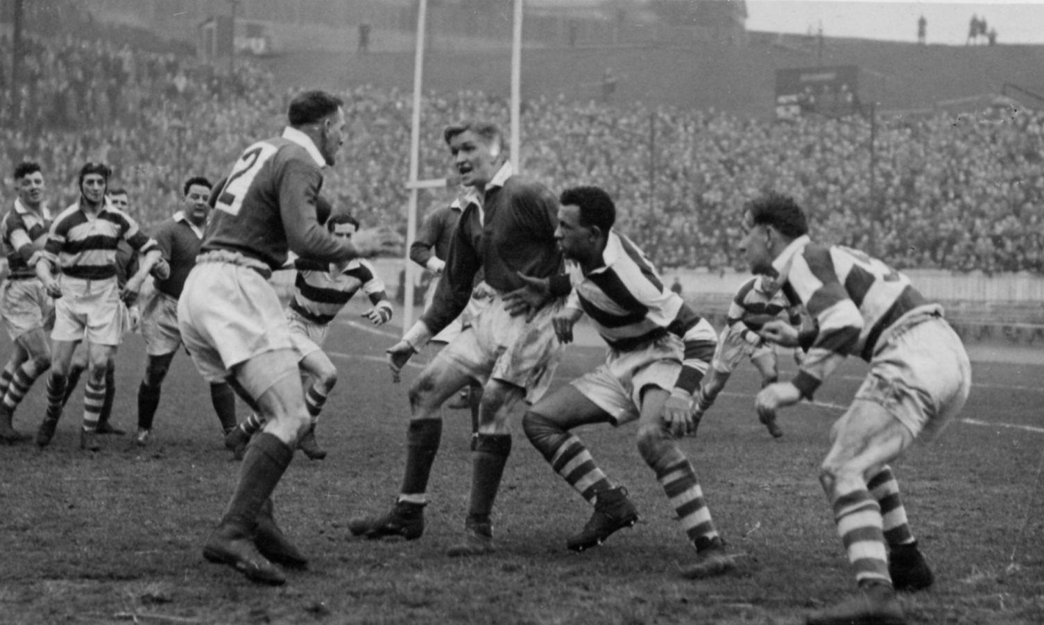 Ken Traill covers Eric Batten when challenged by Alex Givvons and Stan Inglesfield - March 13th 1948.