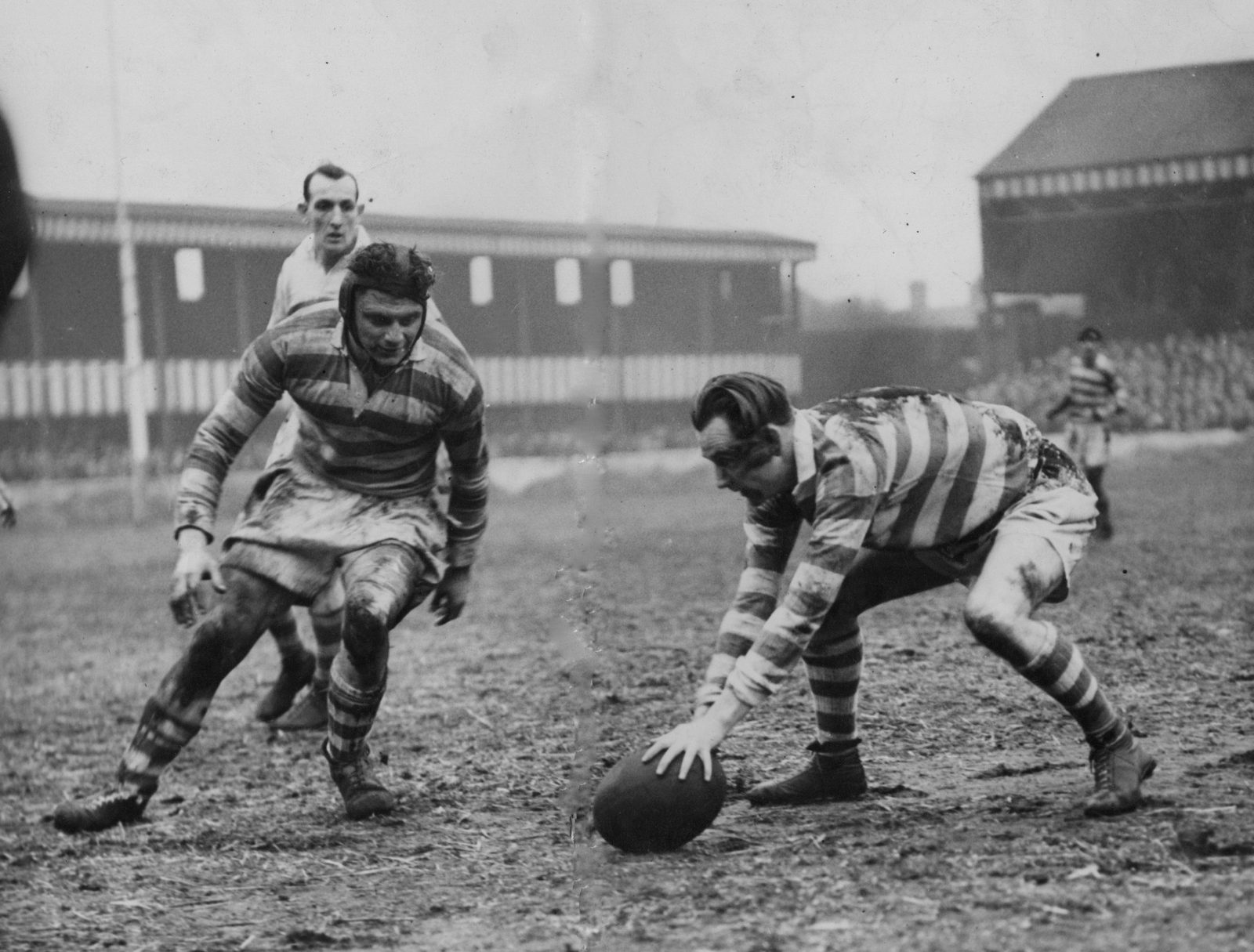 Frank Heyes picks up a loose ball watched by Albert Fearnley & Emlyn Walters - Feb 4th 1950.
