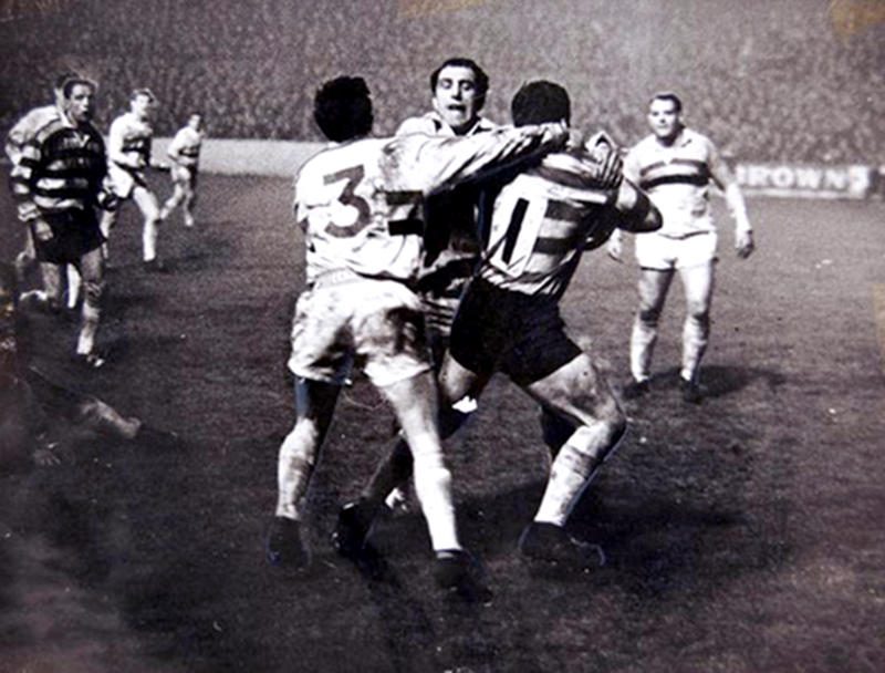 Oldham full back Brian Curry is well held - Feb 29th 1968.