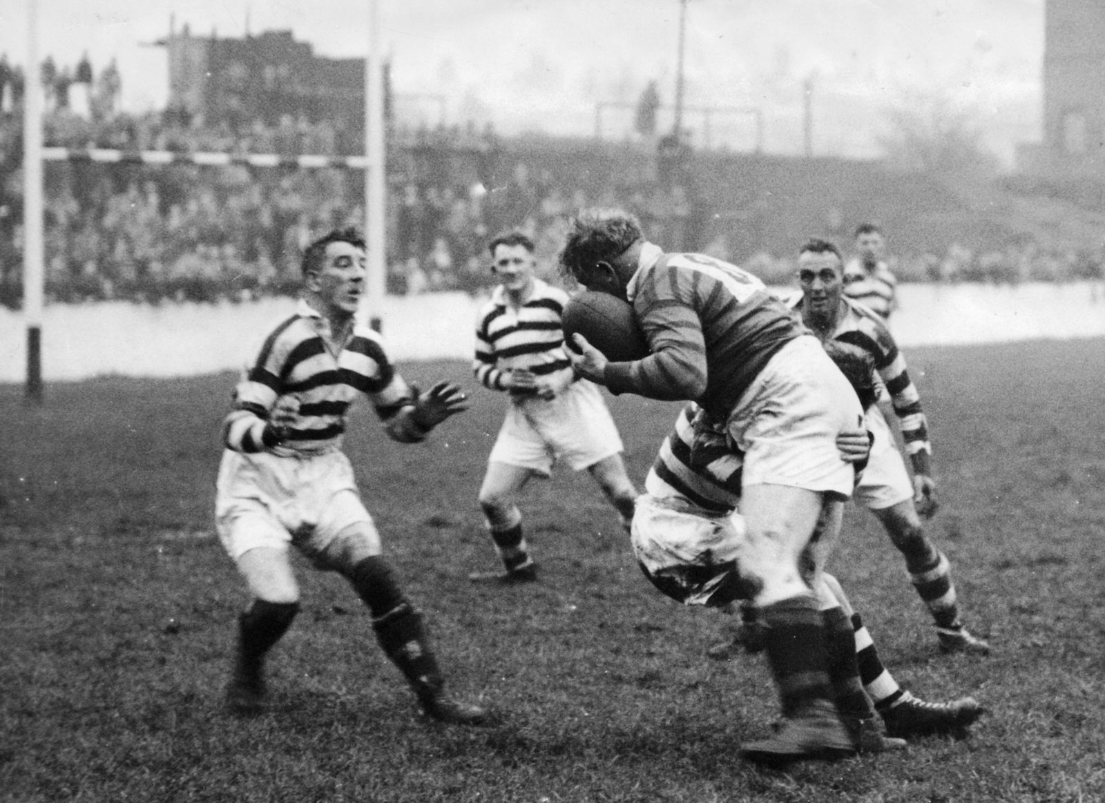 Action v Castleford with Edgar Brooks, Billy Moore and Doug Shaw closing on a Castleford player Nov 16th 1946.