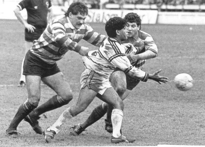 Mick Worrall and Ray Ashton make a tackle v Cas in the Cup semi-final - March 22nd 1986.