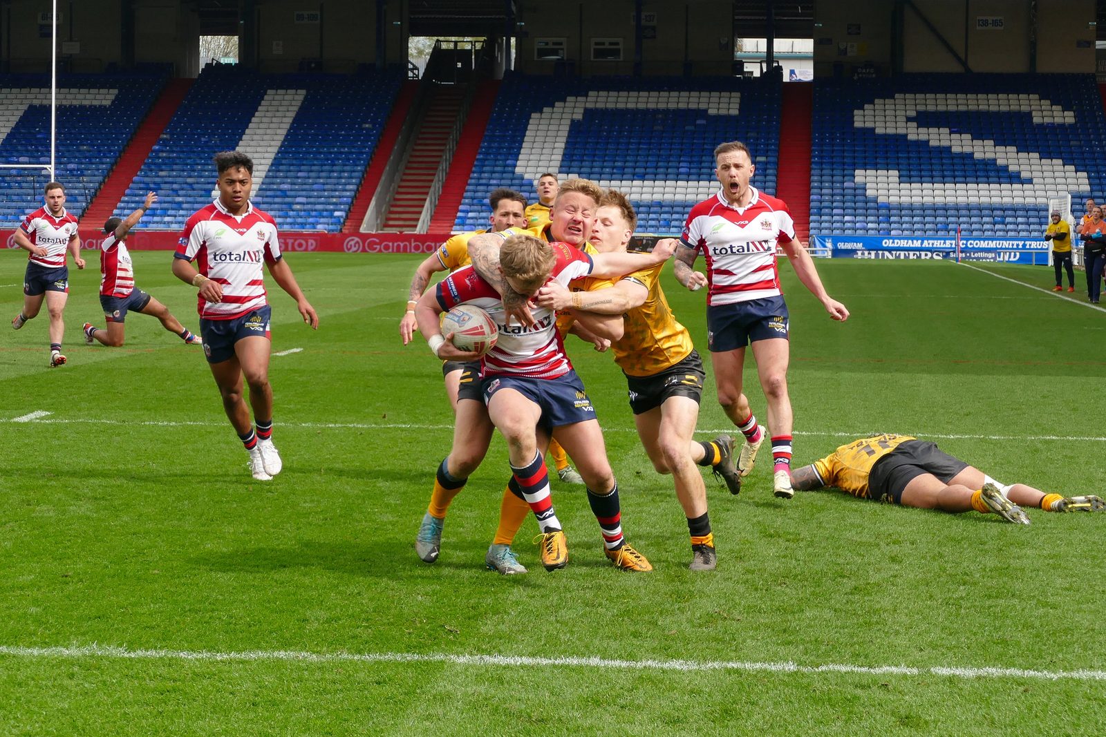 Cian Tyrer pushes towards the line. Oldham v Cornwall, April 14, 2024.
