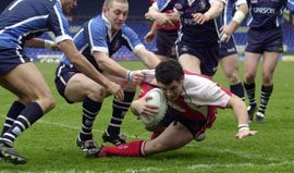 JAMES BUNYAN dives over the line for the first of his four tries in the high-scoring win over Featherstone Rovers - April 12th 2004..