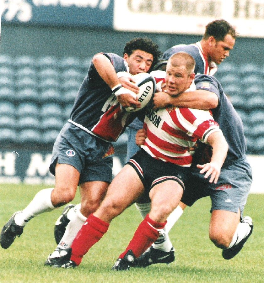 Patrick Entat tries to wrestke the ball from John Clarke - June 26th 1996.