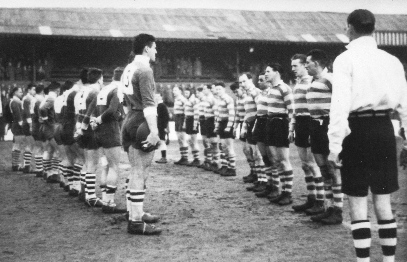 Oldham and Villeneuve line up for the anthems before the match - April 10th 1950.