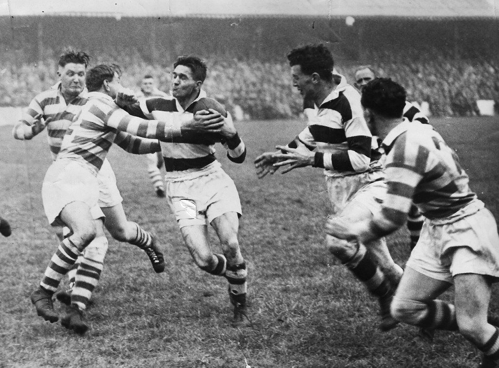 Les Thomas takes on the Halifax defence with Harry Ogden in support - Sep 27th 1947.