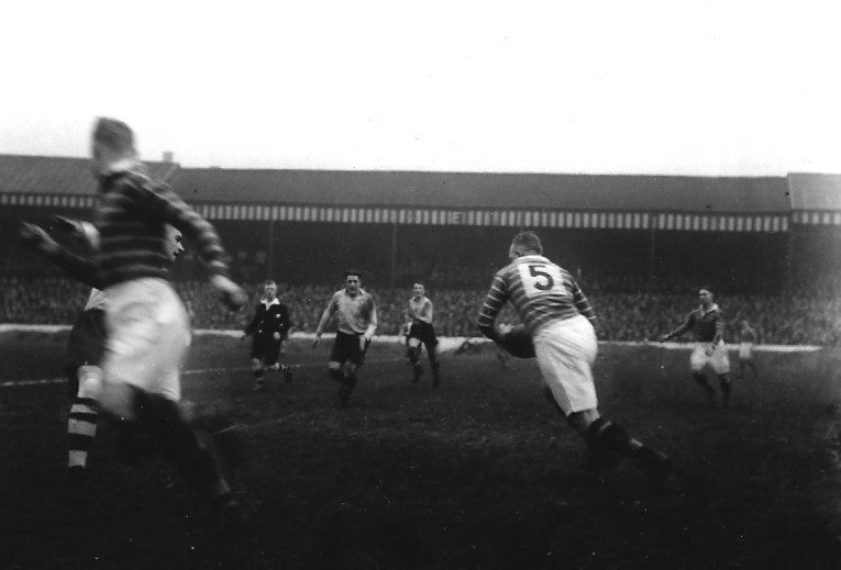 Billy Moore and Edgar Brookes advance on the Huddersfield left winger, Ray Markham, in the match at Watersheddings - Feb 5th 1938.
