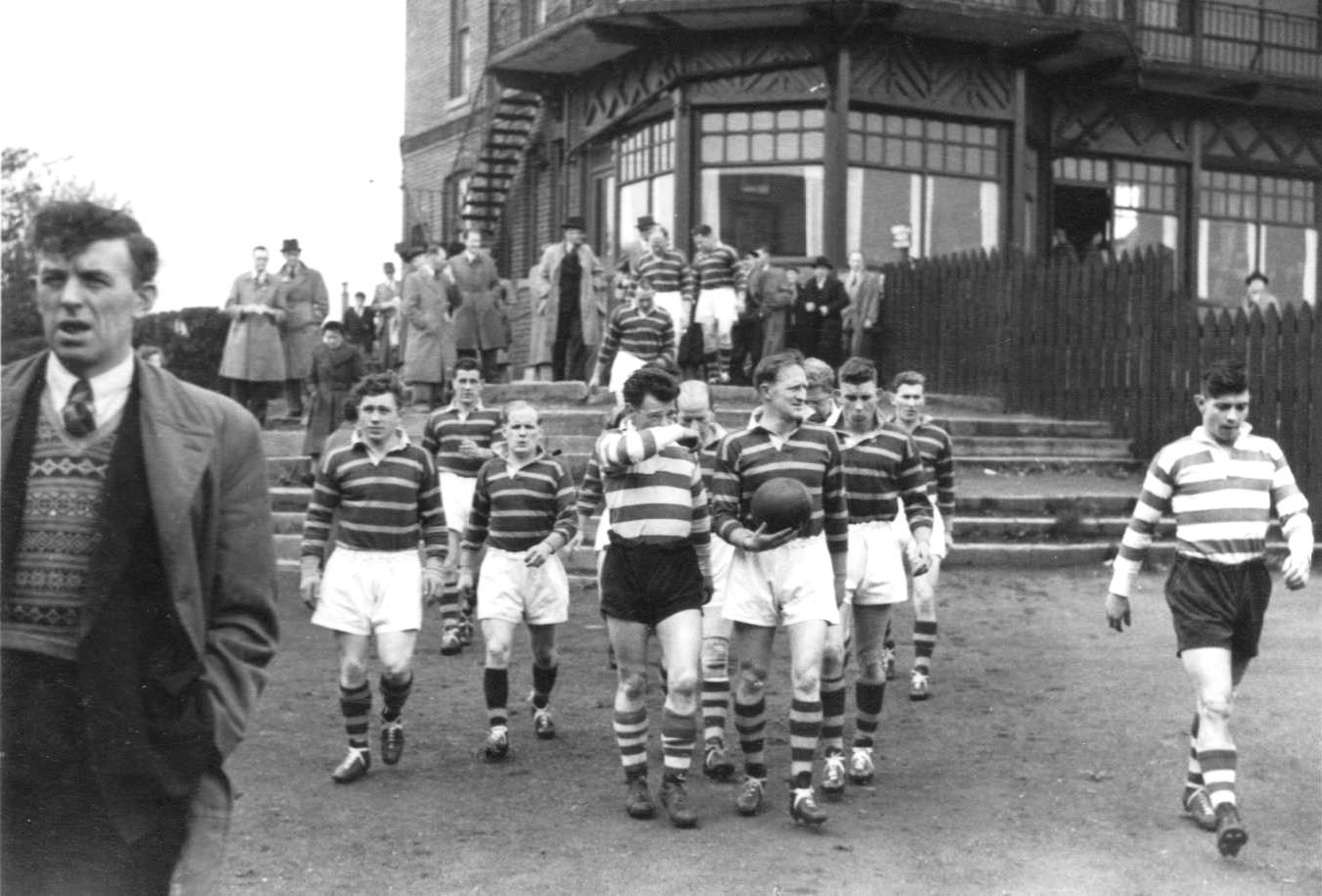 Oldham and Huddersfield on their way to the pitch before the Harry Ogden benefit match - May 16th 1953.