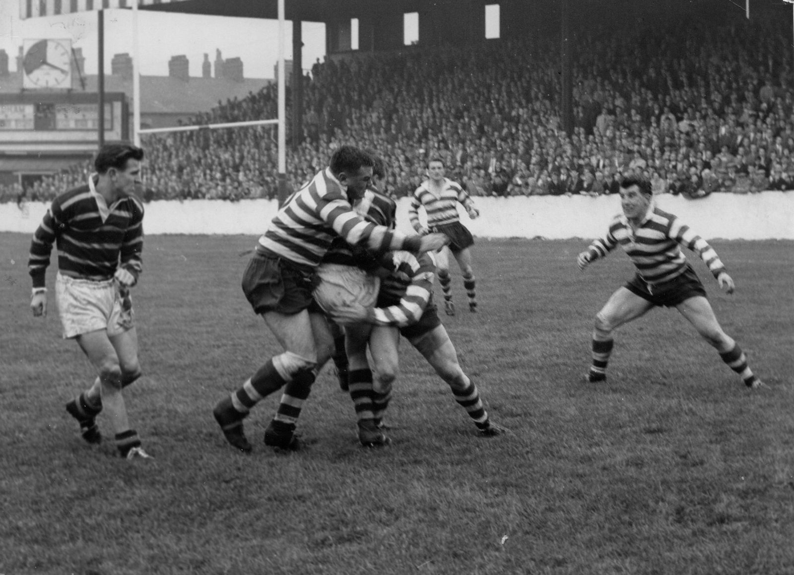 Alf Mumberson wraps up a Huddersfield player watched by Peter Smethurst and Geoff Sims - Oct 13th 1962.