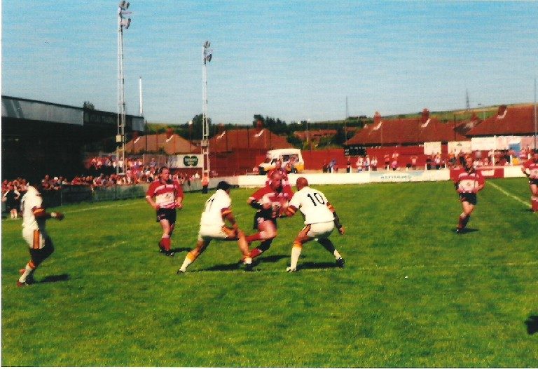 Paul Norton on the attack. Oldham v Huddersfield at Hurst Cross - July 28th 2002.