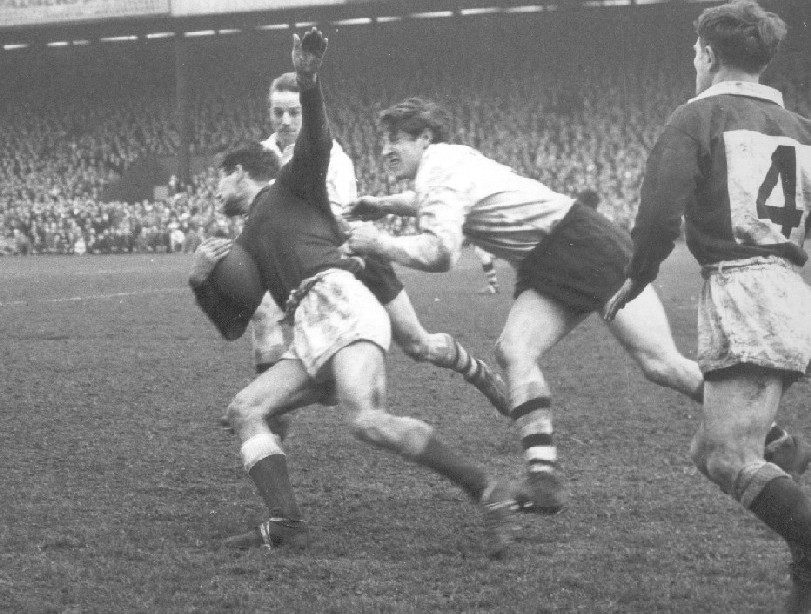 John Donovan makes a tackle with Vince Nestor in support - April 11th 1964.