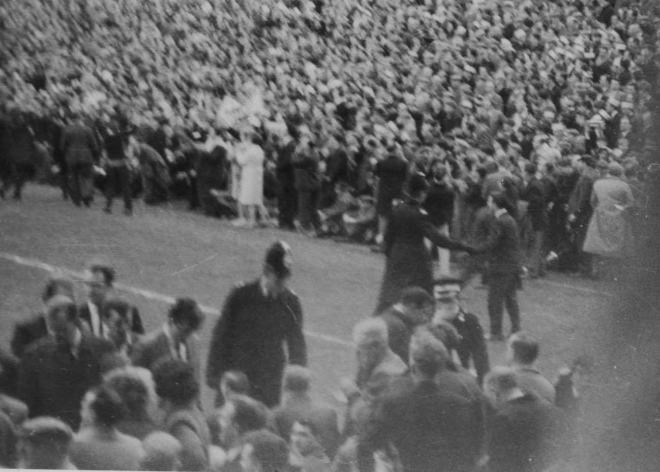 The Police clear the fans off the pitch - April 11th 1964.