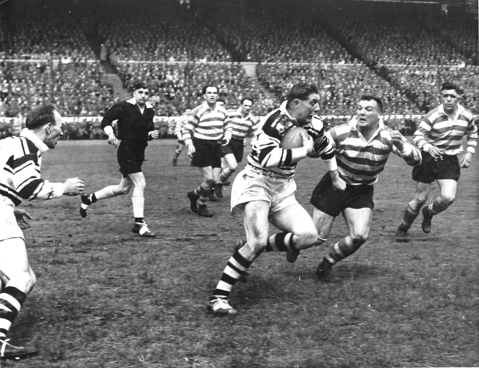 Don Vines moves in on Johnny Whiteley - May 18th 1957.