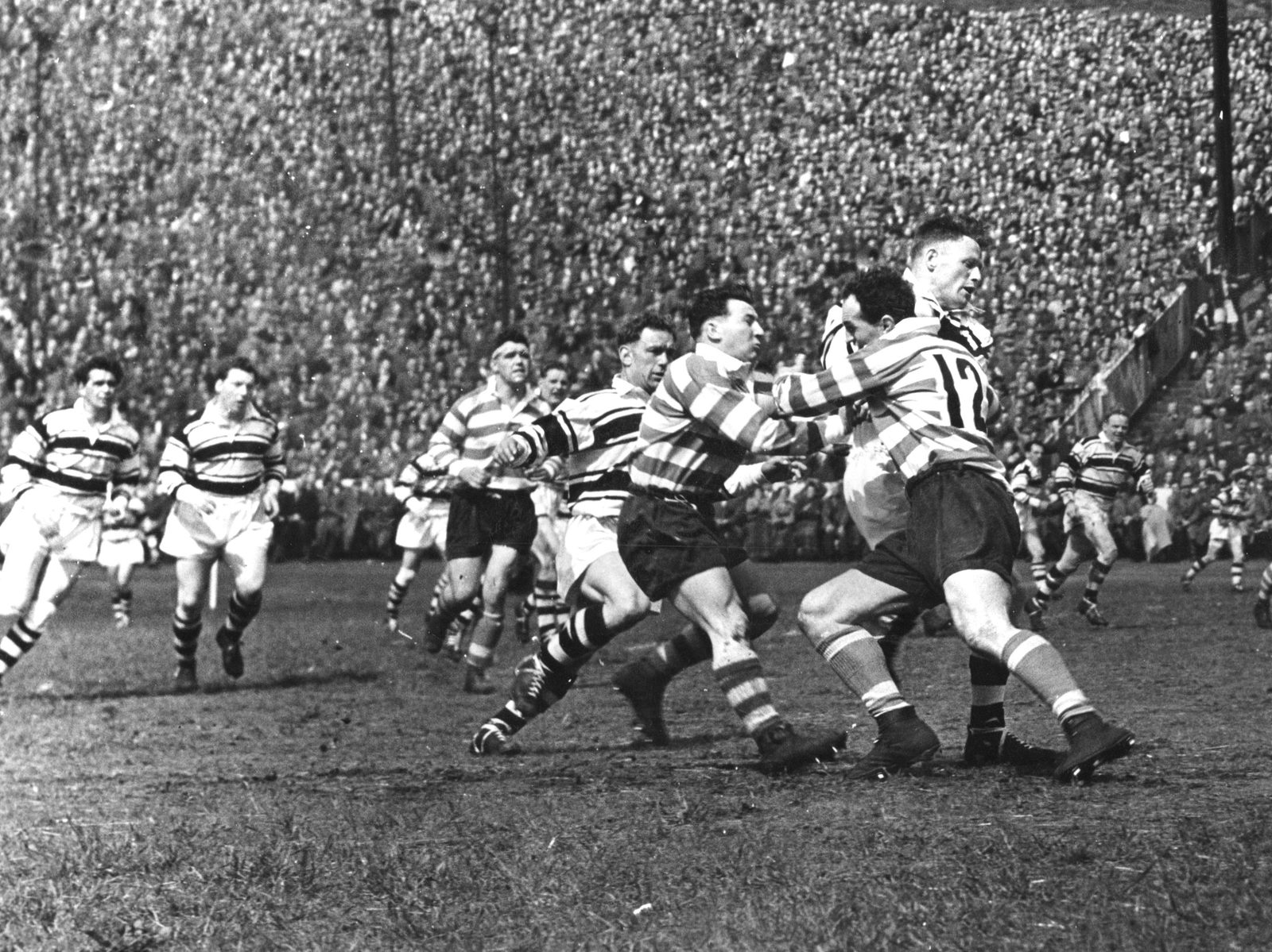 Frank Pitchford and Charlie Winslade make a tackle - May 18th 1957.
