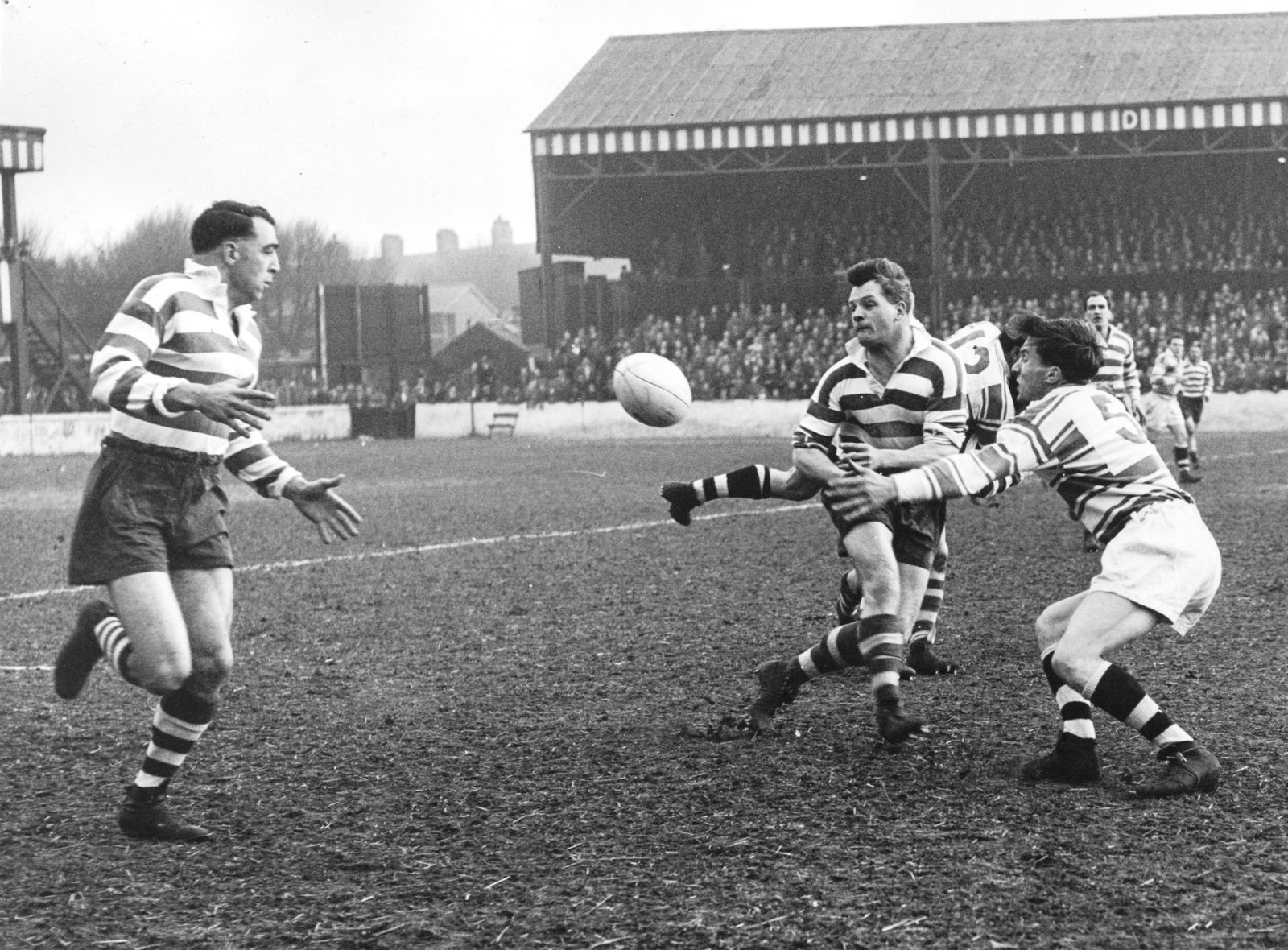 Ayres passes to Cracknell when challenged by Harrison - April 16th 1958.