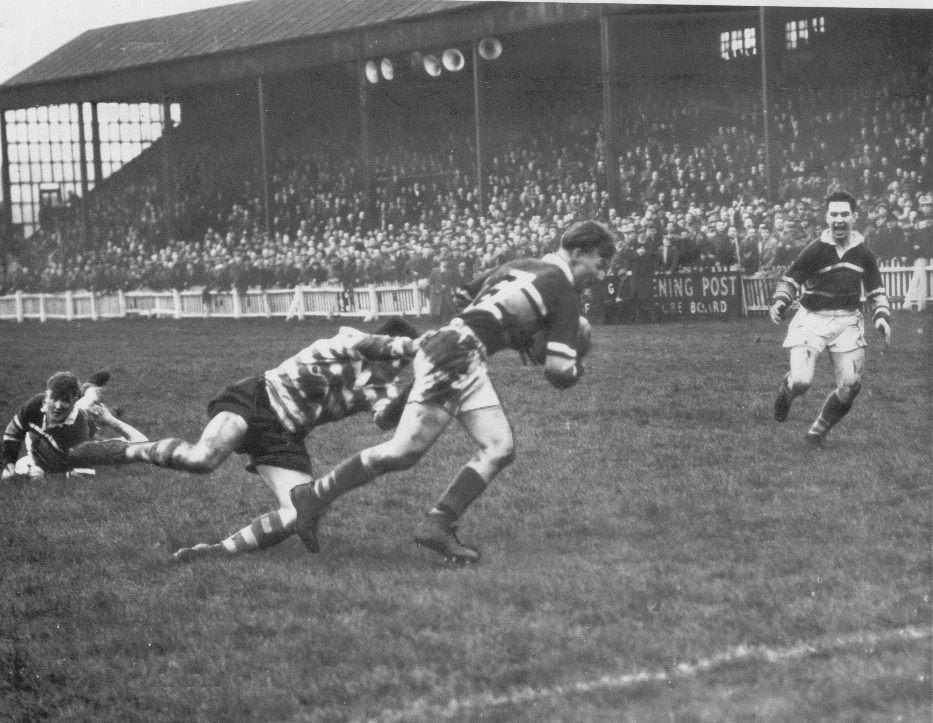 Johnny Noon tackles Brian Gabbitas at Parkside - Dec 7th 1957.