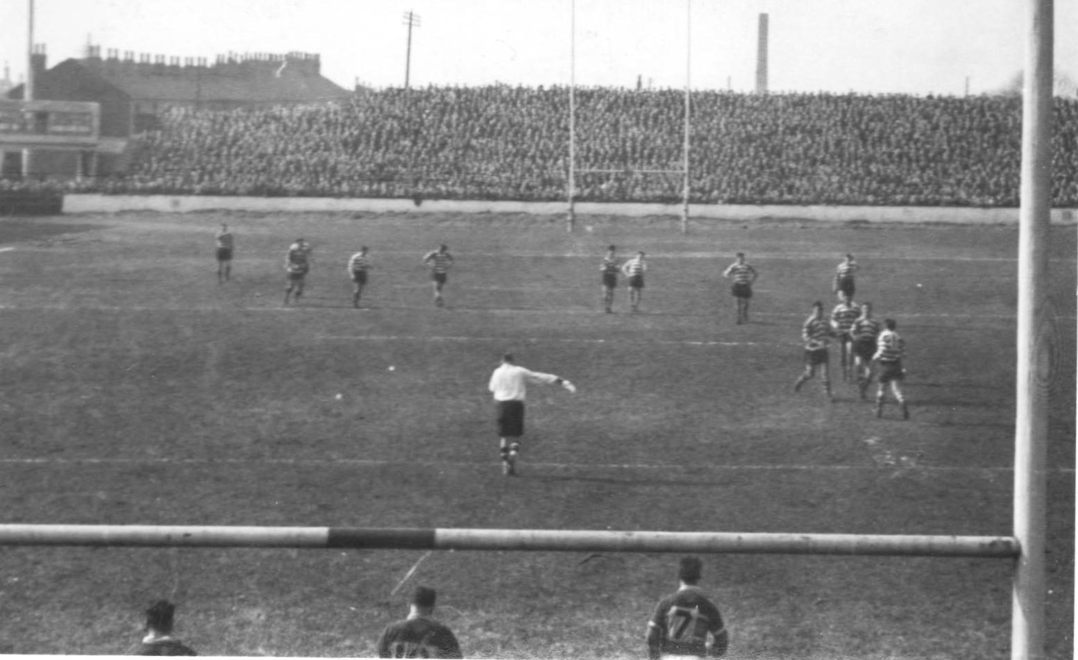 Oldham players go to congratulate Bernard Ganley after record goal v Hunslet - April 12th 1958.