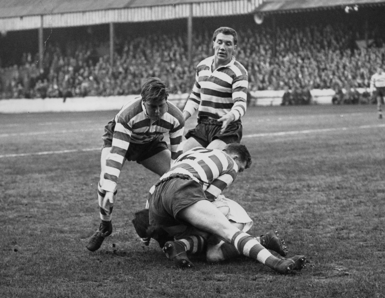 Ike Southward, Des McKeown and Roger Dufty bring down a Hunslet player - April 14th 1959.