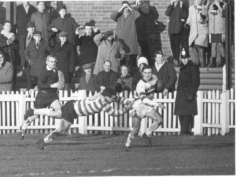 Colin Smith brings off a superb cover tackle on Tommy Thompson in the Challenge Cup-tie at Hunslet - Feb 3rd 1968.