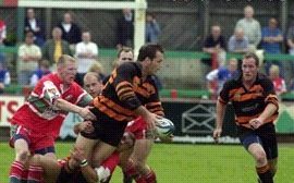 Steve Molloy looks to pass to David Gibbons - June 2nd 2002.