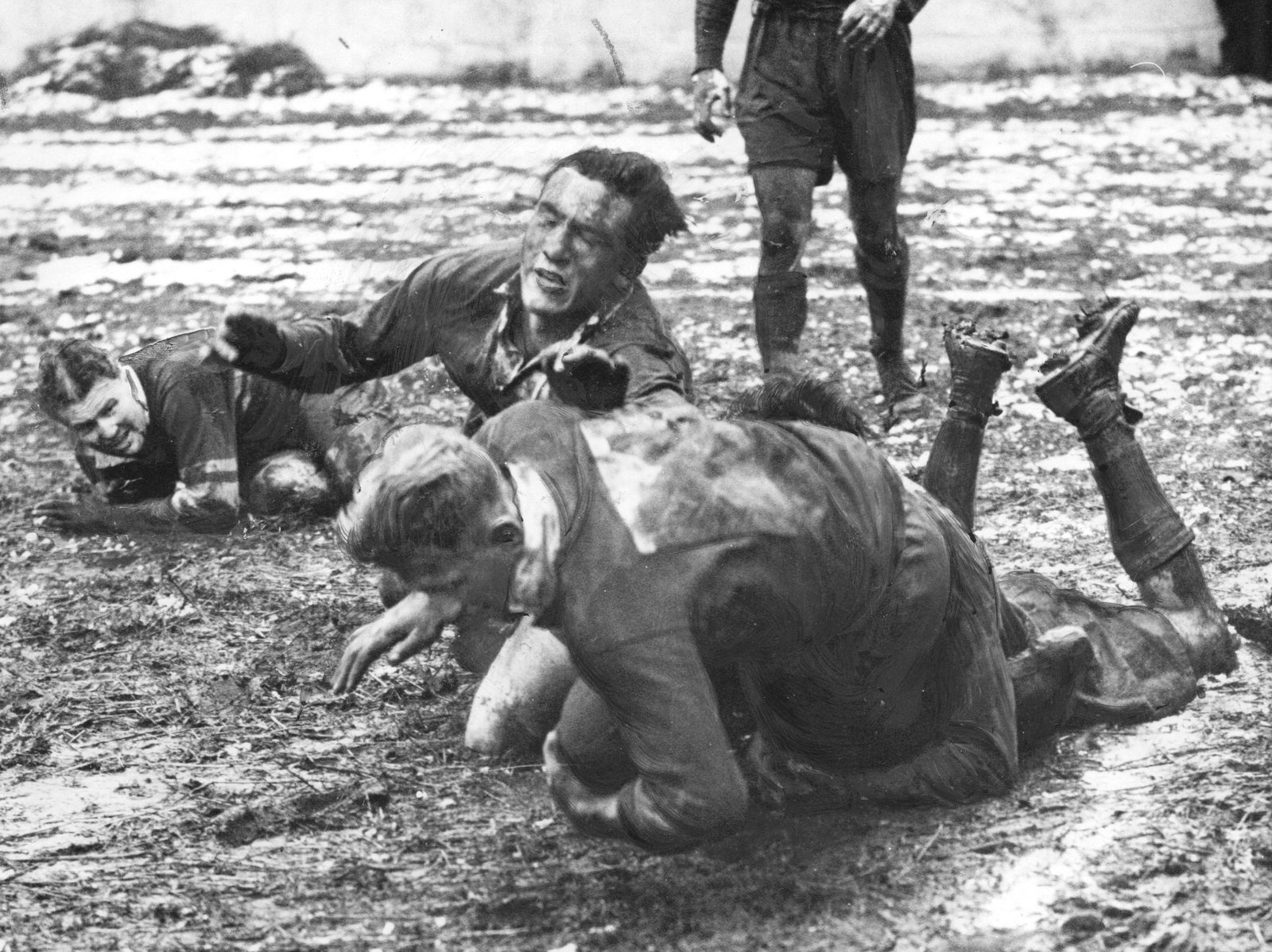 Walt Nicholson bring down Gordon Brown as Bert Cook look on - Feb 17th 1951.