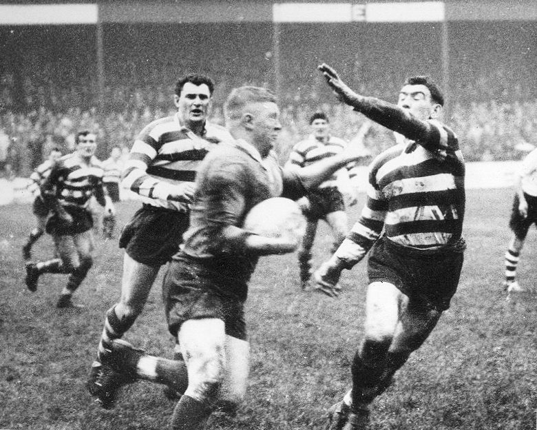 Fairbank takes on McIntyre. Oldham v Leeds - Dec 3rd 1960.
