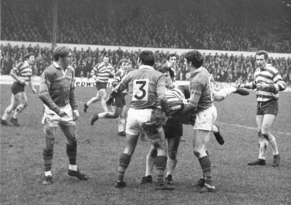 Terry garrett is tackled by Sid Hynes and Alan Smith while Tony Wainwright, Ged Smith and Dick Bonser look on - Jan 23rd 1971.