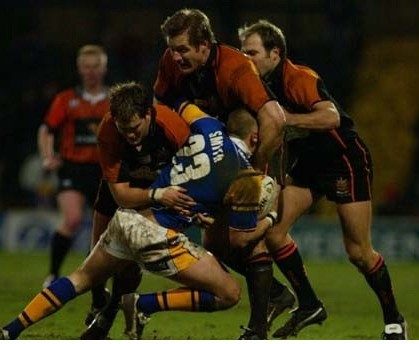 Keen defence from Oldham in the Barrie McDermott testimonial - Jan 21st 2005.