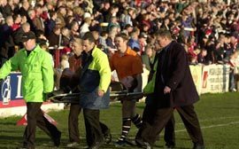 John Hough is carried off duringat Hilton Park Feb 15th 2004..