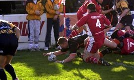 Oldham centre Iain Marsh crashes through to score the opening try of the game after only two minutes - Feb 15th 2004.